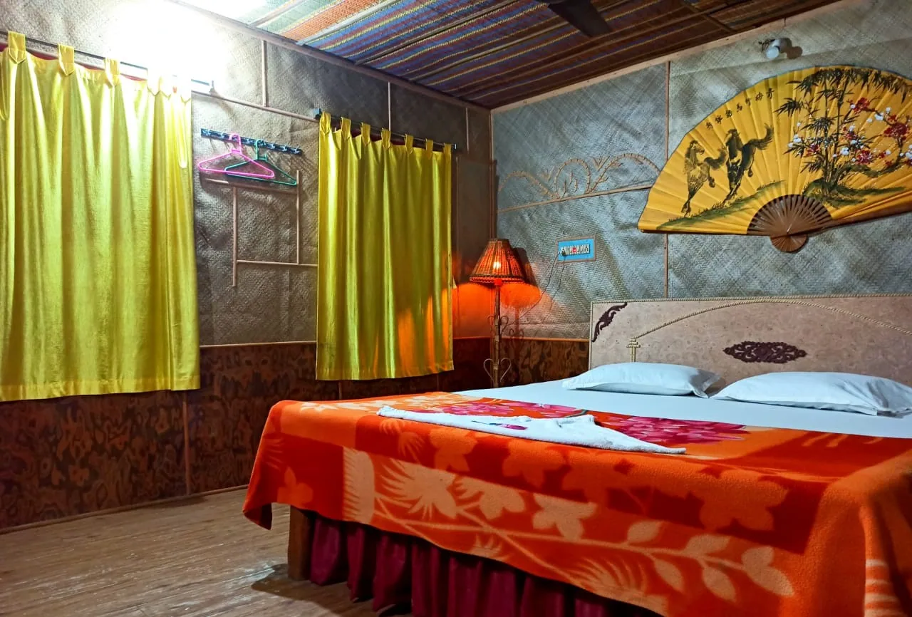 Premium executive cottage room with warm lighting