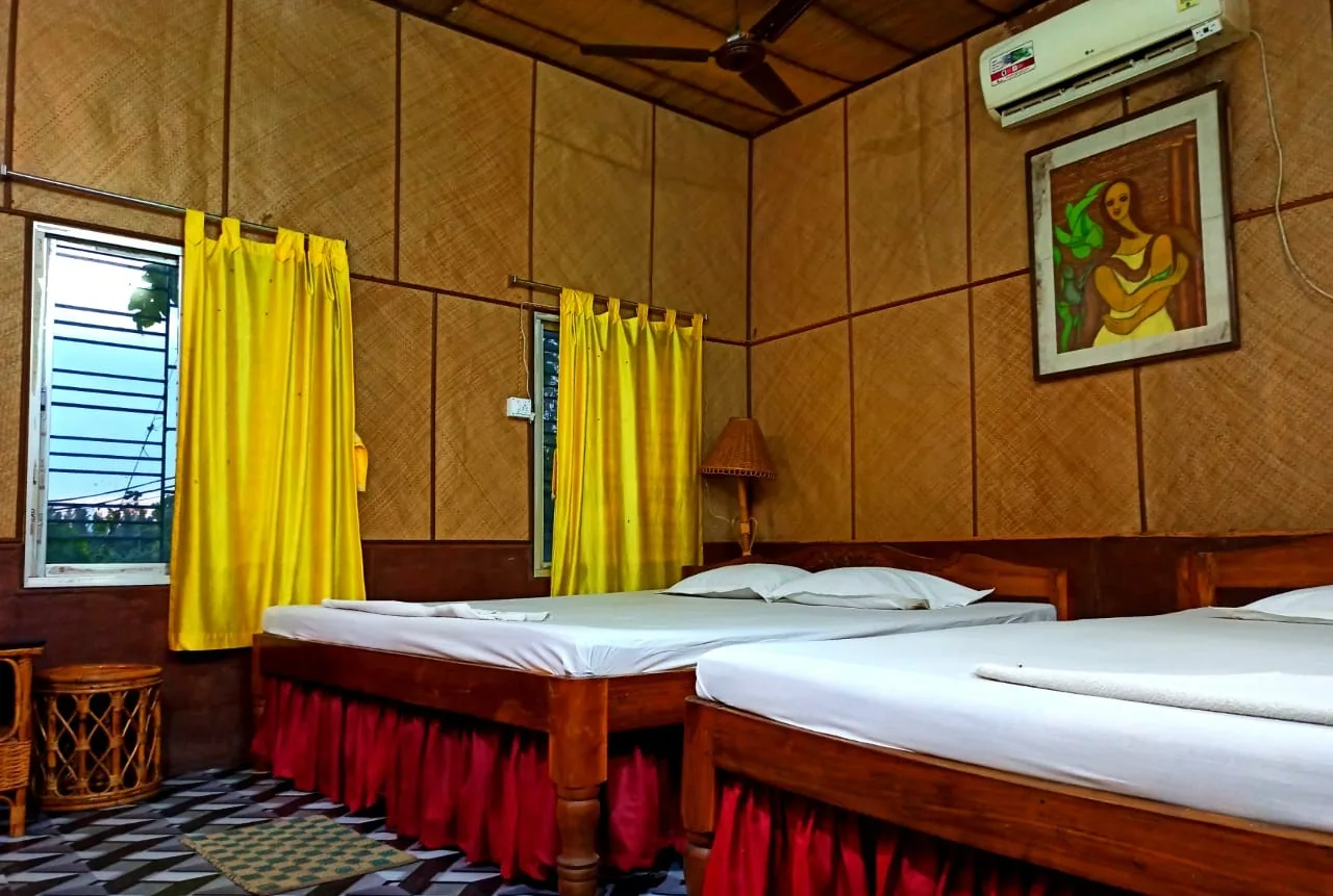 Standard AC room with twin beds and air conditioning